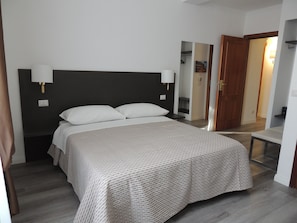 Classic Room, Non Smoking, Housekeeping (Camera 1) | Egyptian cotton sheets, premium bedding, down comforters, minibar