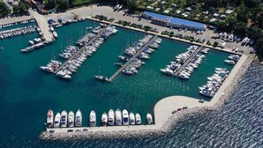 An aerial view of a marina with multiple docks and boats. - Luxury apartment Matic Seaview (Funtana)