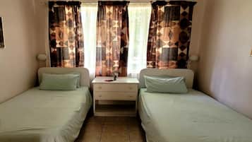 Economy Twin Room | 4 bedrooms, free WiFi, bed sheets