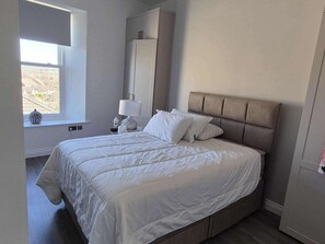 Apartamento | 2 quartos, Wi-Fi de cortesia, roupa de cama