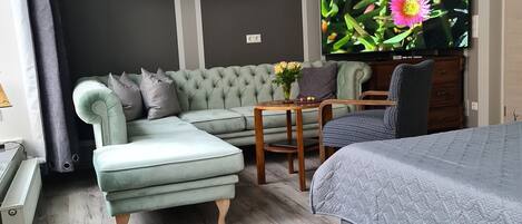 Comfort Apartment, Balcony | Living area | Flat-screen TV