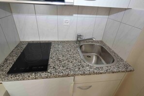 Microwave, stovetop, coffee/tea maker, toaster