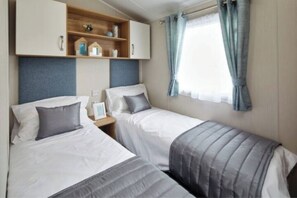 2 chambres, fer et planche à repasser, Wi-Fi, draps fournis