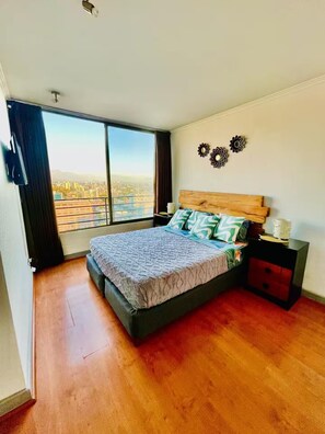 1 dormitorio, tabla de planchar con plancha, wifi y ropa de cama