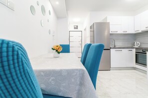 Departamento, vista a la ciudad | Cocina privada