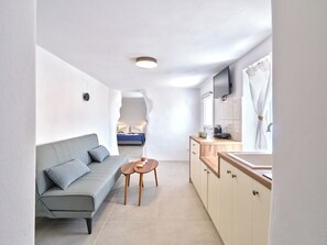Hus - bjergudsigt | Opholdsområde | 32-tommers tv med kabelkanaler