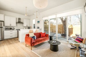 TV, fireplace, books - Modern East Austin Home | Sauna | BBQ | Walkable! (Austin)