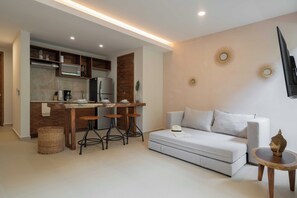 Apartemen Superior | Area keluarga | Smart TV