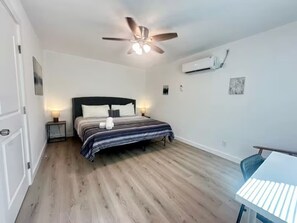 1 bedroom, desk, iron/ironing board, travel crib