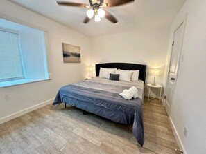 1 bedroom, desk, iron/ironing board, travel crib
