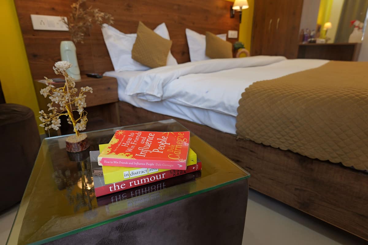 Deluxe Double Room With Balcony | Premium bedding, down comforters, Select Comfort beds, laptop workspace