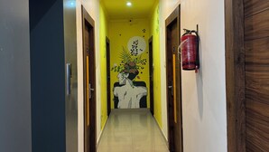 Deluxe Double Room With Balcony | Premium bedding, down comforters, Select Comfort beds, laptop workspace - Vedartha trails (Rishikesh)