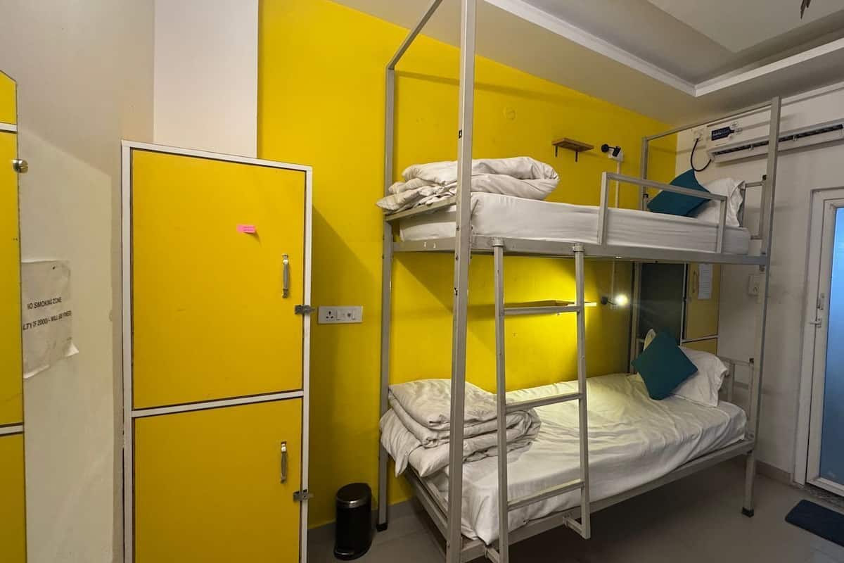 Bed In 4-Bed Female Dormitory Room | Premium bedding, down comforters, Select Comfort beds, laptop workspace