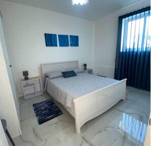 2 habitaciones, tabla de planchar con plancha y wifi gratis