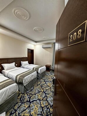 Premium bedding, desk, laptop workspace, iron/ironing board - Al Jemeza Tower Hotel (Makkah)