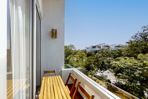 Outdoor dining - Luxurious 2BR Retreat with Pool, TV, Game Room, Lush Gardens & Modern Amenities (Tulum)