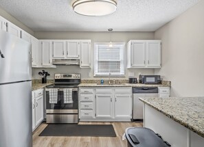 Fridge, microwave, oven, stovetop - Cozy 3BR Gem with Home Theater near Uptown & Airport (Charlotte)