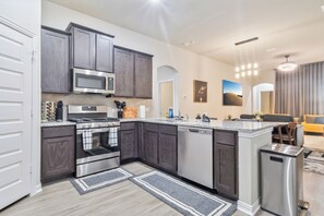 Fridge, microwave, oven, stovetop - Spacious & Stylish 3BR Retreat with 2 Full Baths – Your Perfect Getaway! (Converse)