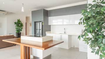 Fridge, microwave, stovetop, coffee/tea maker