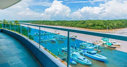 Serene condo with ocean views, modern amenities & pool access