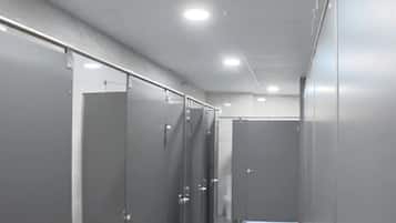 Basic Shared Dormitory | Bathroom | Shower, soap, shampoo, toilet paper