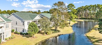Beautiful dog-friendly coastal home close to beach, AC, and shared pool.