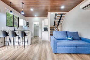 TV - Cozy condo with shared community pool, private washer/dryer, and WiFI (Playa Avellanas)