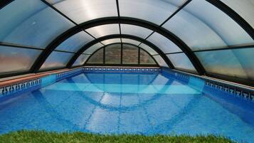 Seasonal outdoor pool, pool loungers