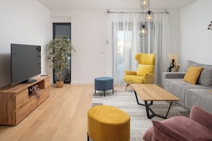 Apartment, 2 Schlafzimmer, barrierefrei, Raucher | Wohnzimmer | Bücher