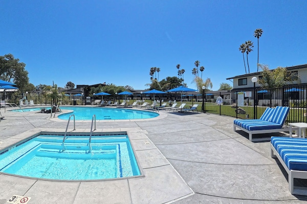 Outdoor pool, open 8:00 AM to 10:00 PM, pool umbrellas, pool loungers