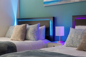 4 habitaciones, tabla de planchar con plancha y cuna de viaje