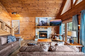 Smart TV, fireplace, table football, books