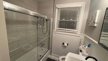 Hair dryer, towels, soap, shampoo