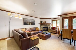 TV, fireplace, books - Mountain condos at ski-in/out property - outdoor pool, hot tub, balcony view (Vail)