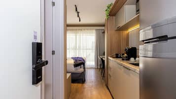 Superior Apartment | Private kitchen | Fridge, microwave, stovetop, espresso maker