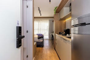 Appartement Supérieur | Cuisine privée | Réfrigérateur, micro-ondes, plaque de cuisson, machine à expresso