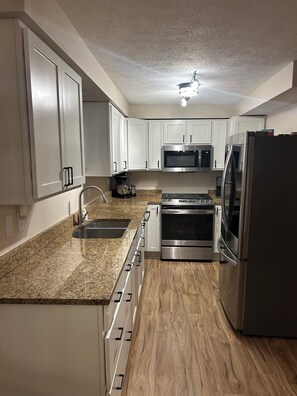 Fridge, microwave, oven, stovetop - Charming 4-bedroom house in the pleasant Village of Elk Rapids. (Elk Rapids)