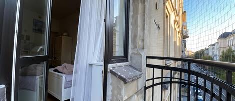 Estudio Confort, vista a la ciudad | Balcón