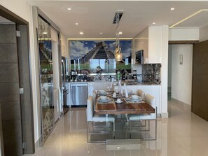 Dining - Garza Blanca 2 Bedroom Beach Suite with ocean-facing deck. (Cancún)