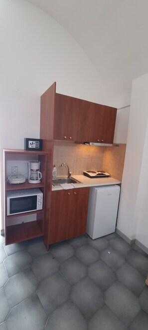 Fridge, microwave, electric kettle, toaster