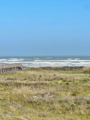 On the beach, sun-loungers, beach towels