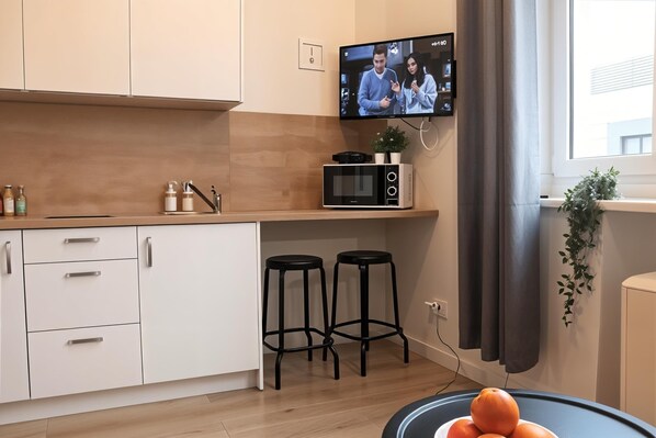 Comfort-studiolejlighed - flere senge - tekøkken - byudsigt | Privat køkken
