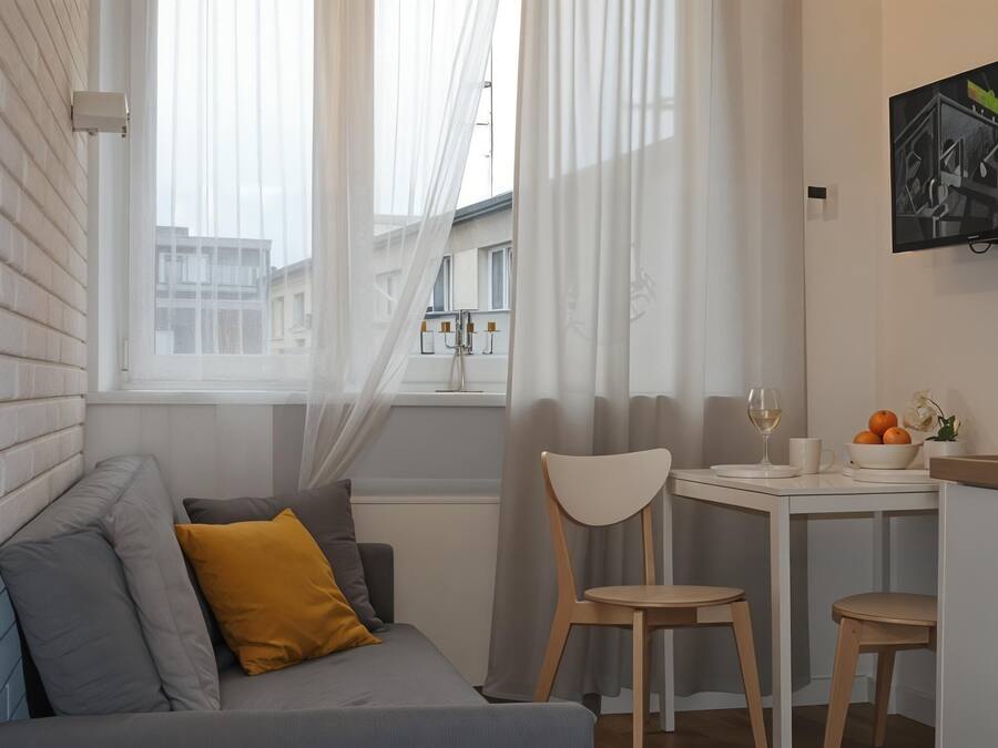 Estúdio conforto, 1 cama de casal e sofá-cama, cozinha americana, vista para o pátio | Área de estar