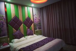 A hotel room with a bed, a nightstand, a wall with a decorative panel, and a window with curtains. - Shule Hostel (Shanghai)