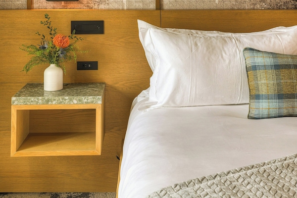 Iron/ironing board, cribs (free), WiFi (free), bed sheets