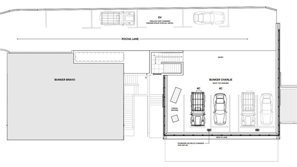A parking layout with a Tesla EV fast charger, a Bunker Bravo area, and a Bunker Charlie section with roof top parking and casual seating.