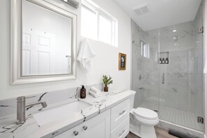 Hair dryer, towels, soap, toilet paper