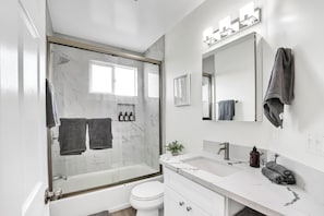 Hair dryer, towels, soap, toilet paper