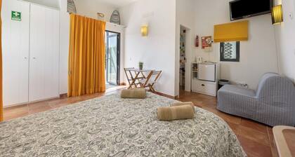 Habitación 'Amado' con jardín compartido y Wi-Fi