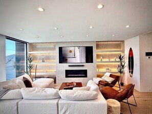 Smart TV, fireplace, ping pong, music library